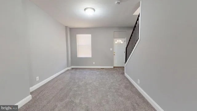 an empty room with windows