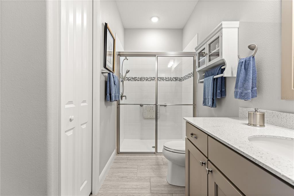 9099 Southwest 89th Loop Ocala, FL 34481 - Photo 28 of 66 a bathroom with a sink and a mirror