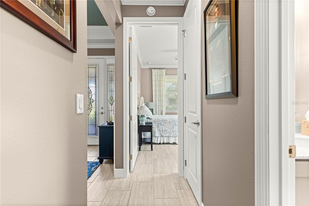 9099 Southwest 89th Loop Ocala, FL 34481 - Photo 29 of 66 a view of a bedroom from a hallway