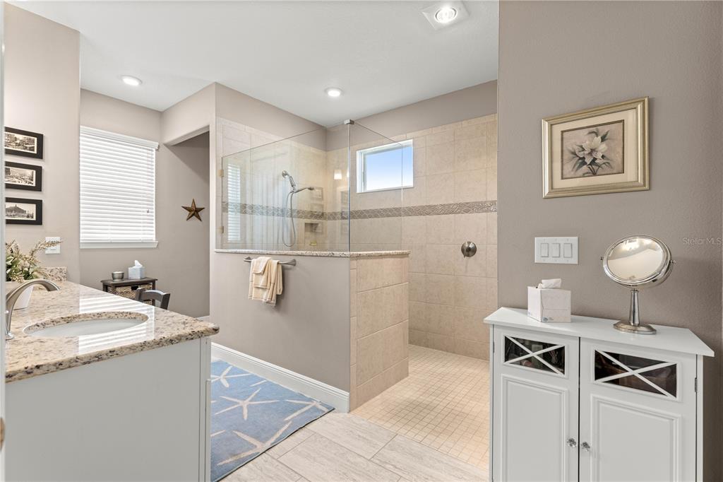 9099 Southwest 89th Loop Ocala, FL 34481 - Photo 37 of 66 a kitchen with a sink appliances and cabinets