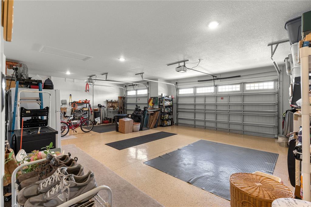 9099 Southwest 89th Loop Ocala, FL 34481 - Photo 46 of 66 a room with lots of gym equipment