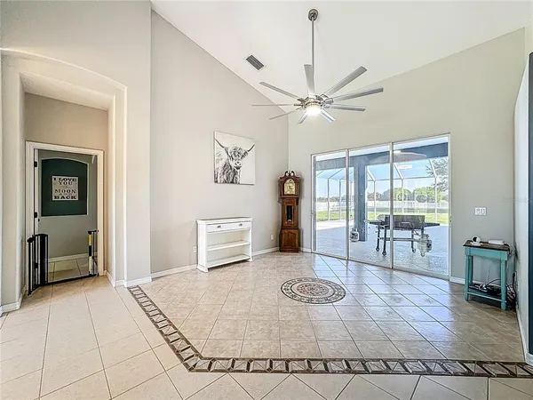 a kitchen with stainless steel appliances granite countertop a sink dishwasher stove top oven and refrigerator with wooden floor
