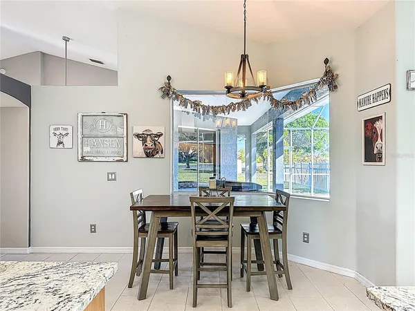 a kitchen with a sink counter top space appliances and cabinets