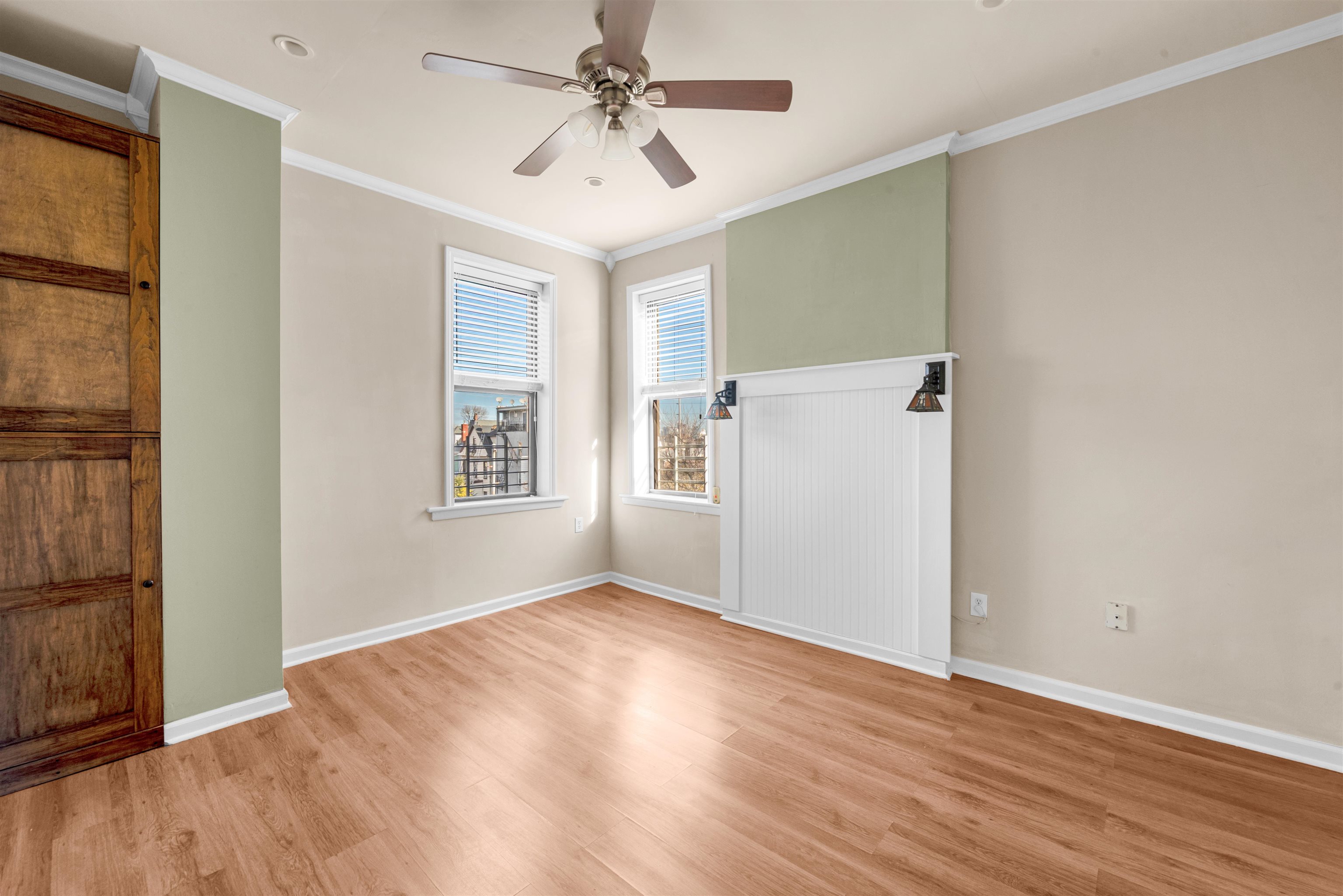 312 Monastery Place, Unit 3R Union City, NJ 07087 - Photo 5 of 16 wooden floor in an empty room with a window