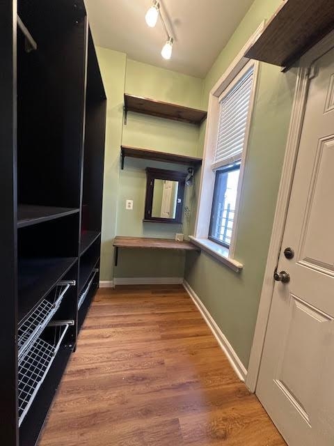 312 Monastery Place, Unit 3R Union City, NJ 07087 - Photo 6 of 16 a view of hallway with stairs and wooden floor