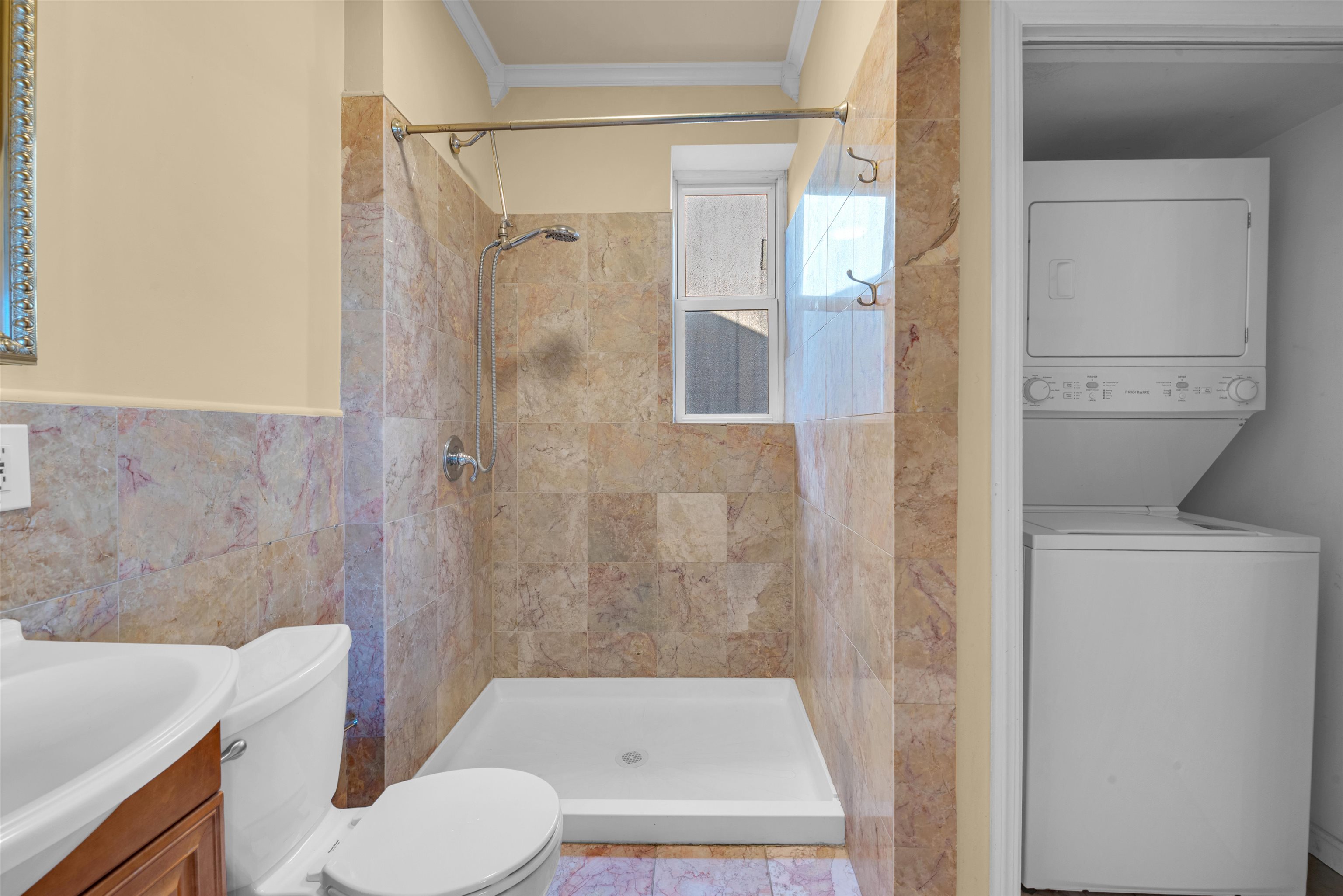 312 Monastery Place, Unit 3R Union City, NJ 07087 - Photo 7 of 16 a bathroom with a sink toilet and shower