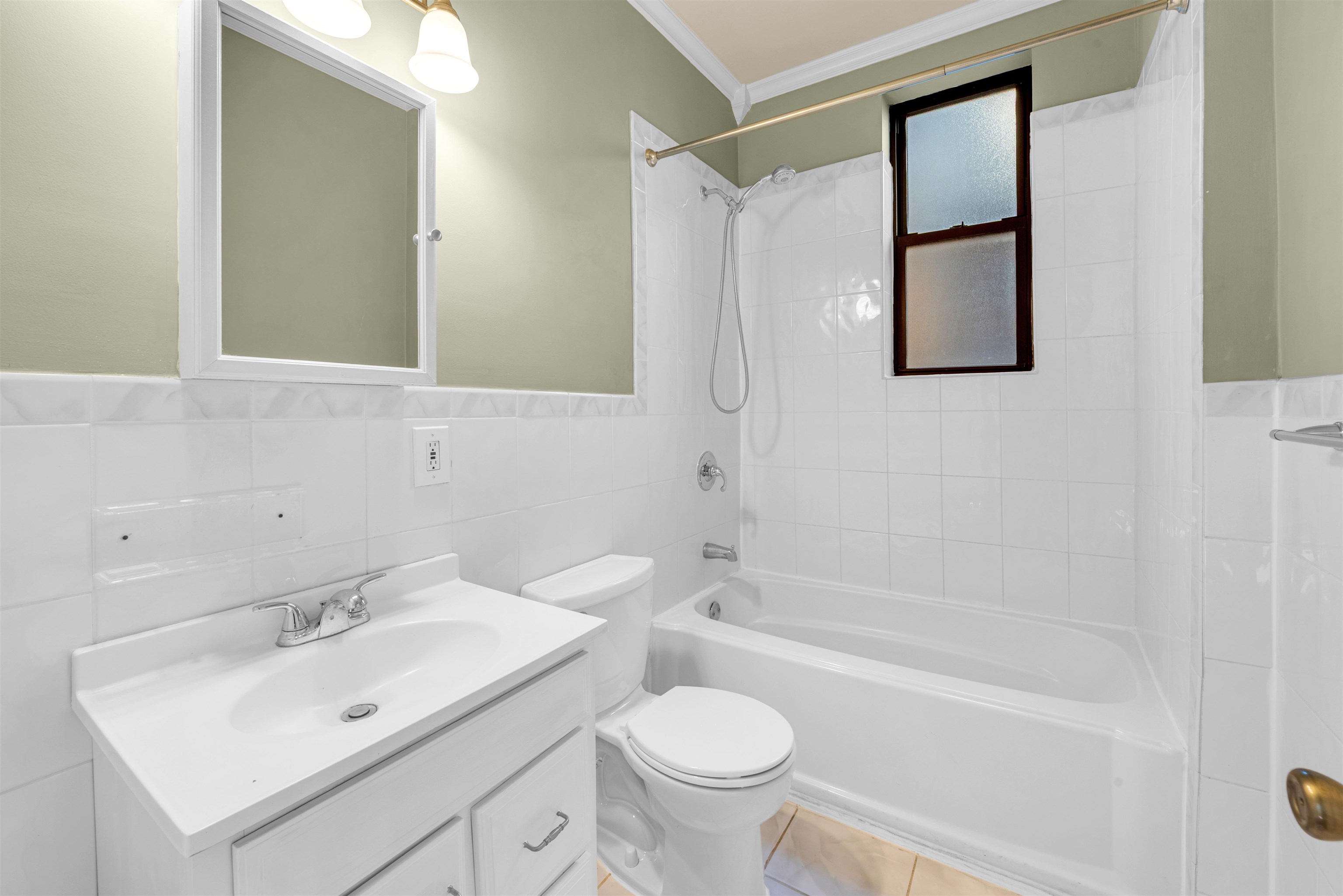 312 Monastery Place, Unit 3R Union City, NJ 07087 - Photo 10 of 16 a bathroom with a sink mirror toilet and bathtub