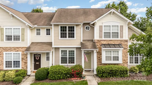 front view of a house and a yard