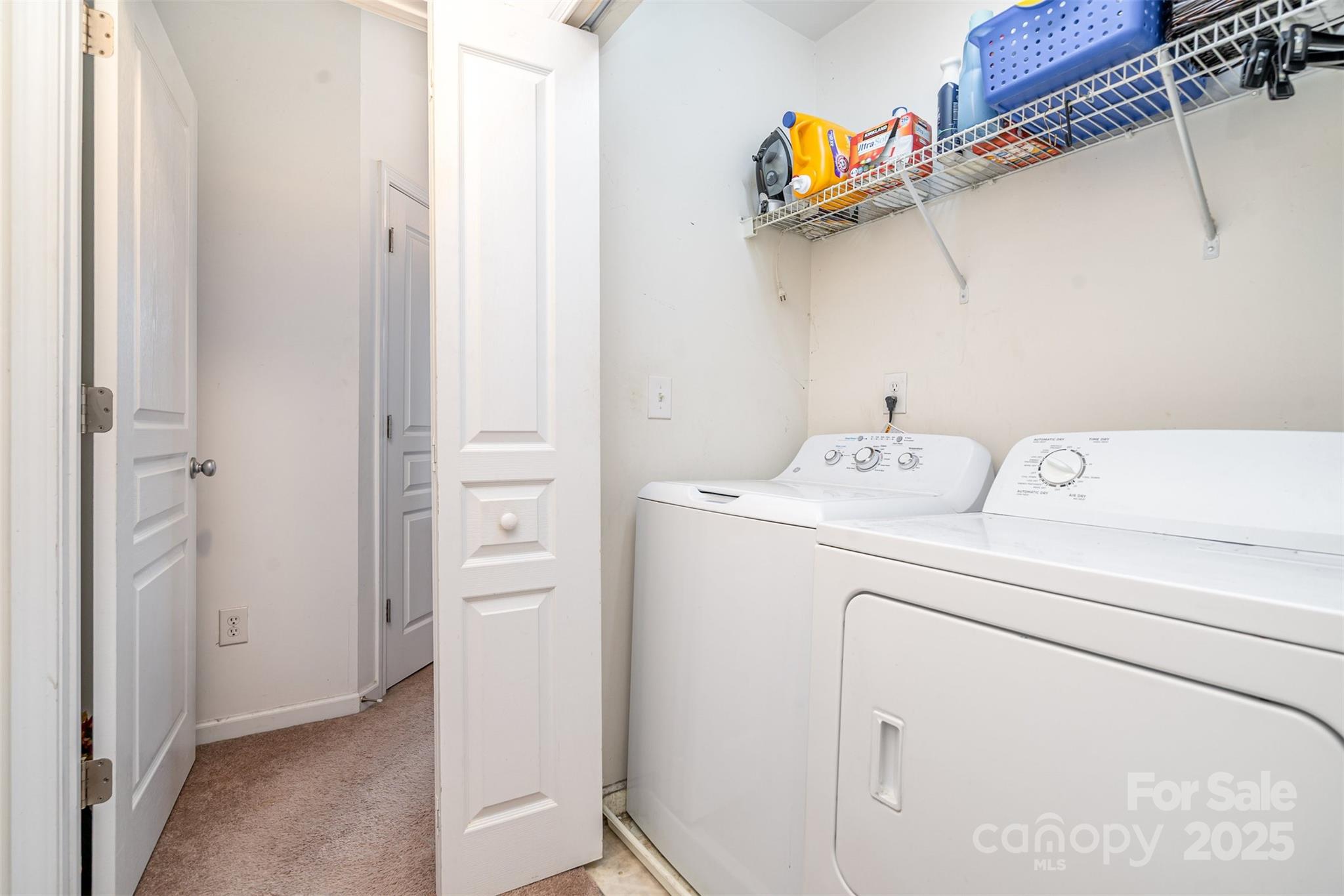 208 Dawn Mist Lane Fort Mill, SC 29708 - Photo 21 of 30 a utility room with dryer and washer