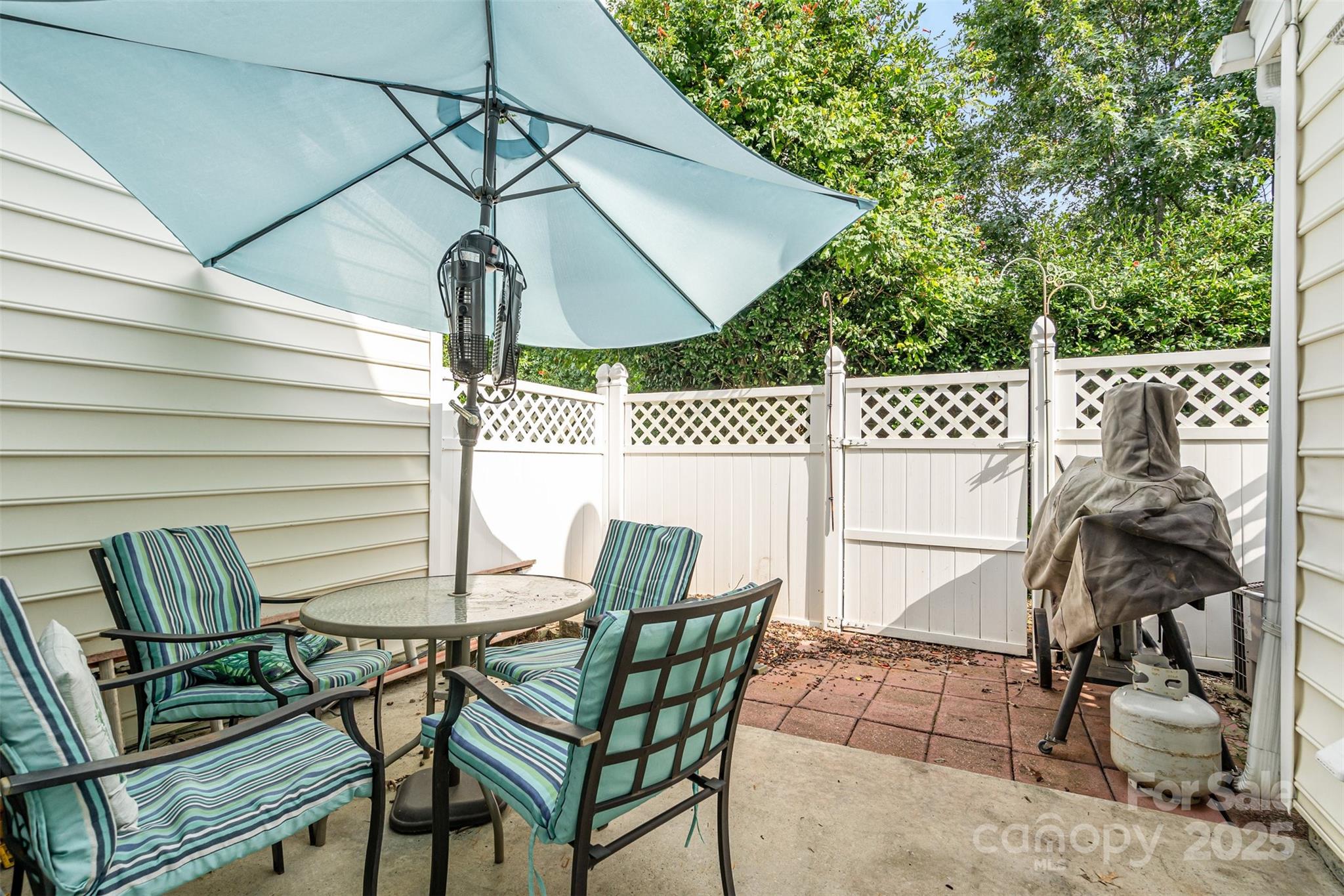 208 Dawn Mist Lane Fort Mill, SC 29708 - Photo 24 of 30 a view of a patio with a table and chairs