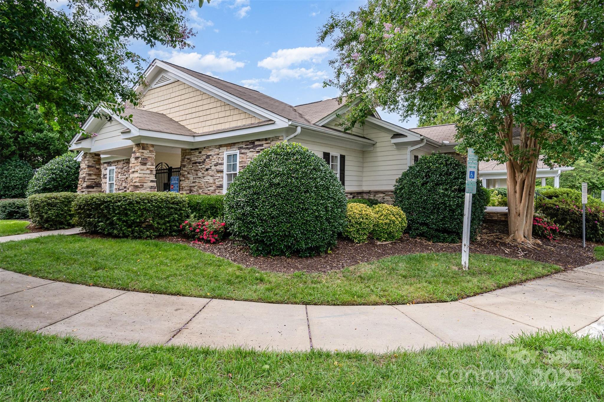 208 Dawn Mist Lane Fort Mill, SC 29708 - Photo 28 of 30 a front view of a house with a garden
