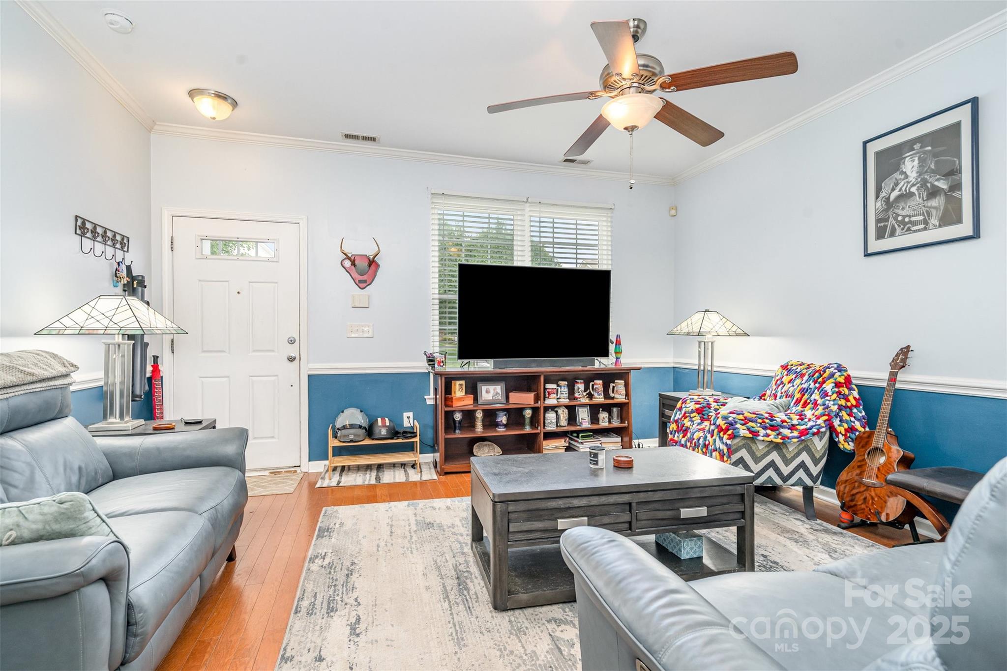 208 Dawn Mist Lane Fort Mill, SC 29708 - Photo 5 of 30 a living room with furniture and a flat screen tv
