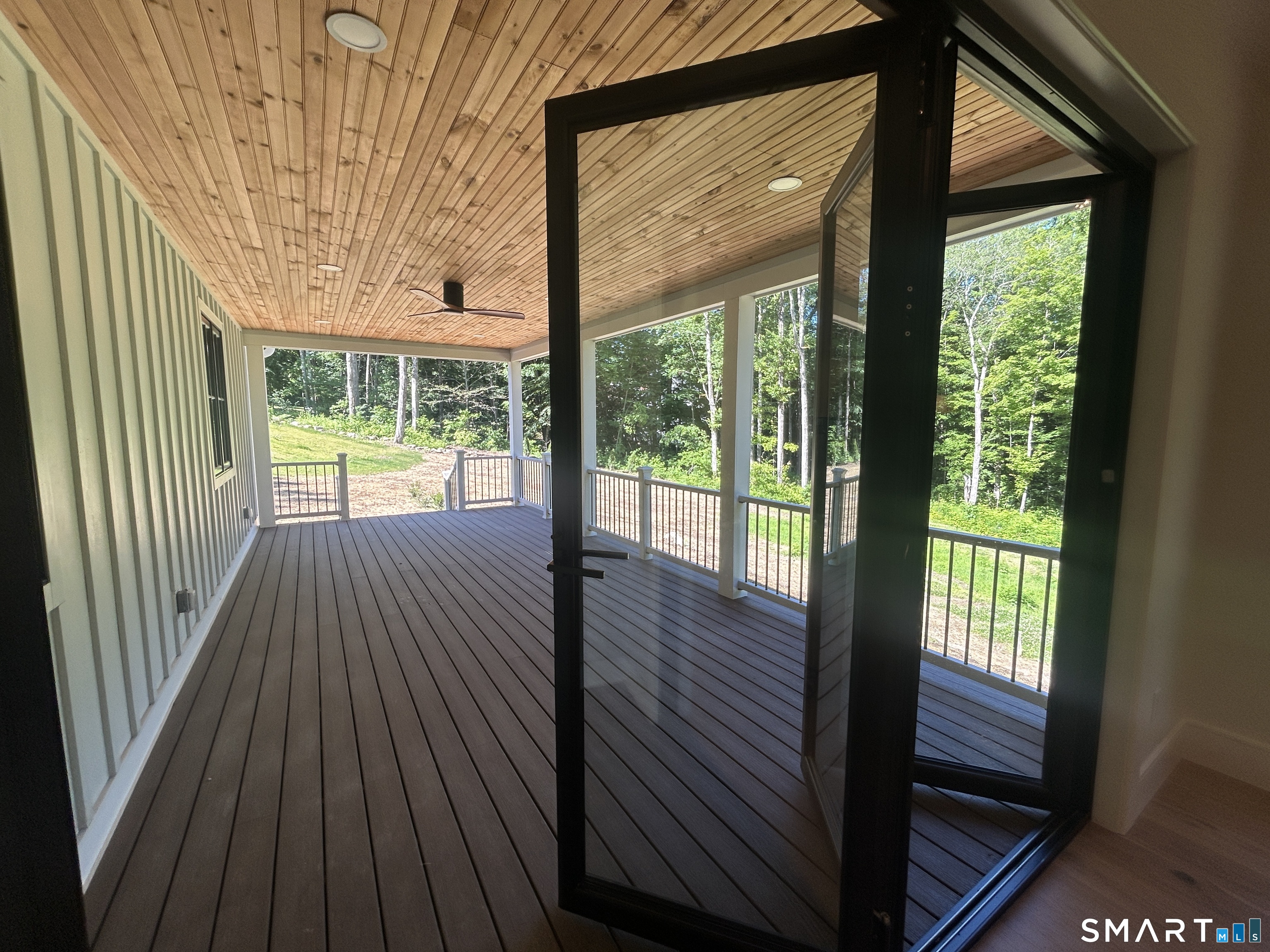 12 Chestnut Lane Washington, CT 06777 - Photo 39 of 40 FOLDING DOORS TO COVERED PORCH