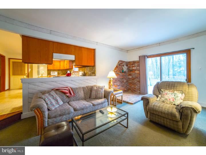 11 Foxchase Road Tabernacle, NJ 08088 - Photo 11 of 25 a living room with furniture and a large window