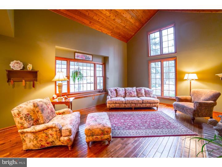 11 Foxchase Road Tabernacle, NJ 08088 - Photo 2 of 25 a bedroom with furniture and a large window