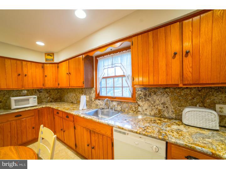 11 Foxchase Road Tabernacle, NJ 08088 - Photo 9 of 25 a kitchen with a sink and a window