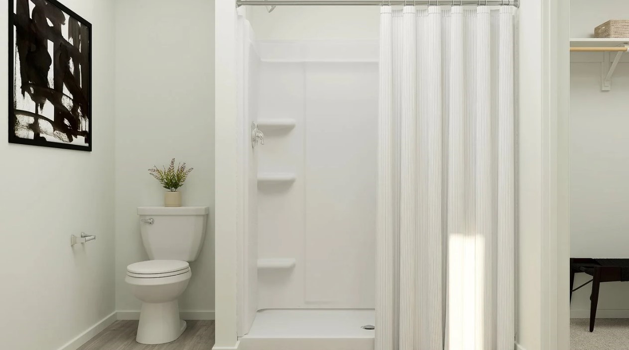 2503 American Ruby Drive Rosharon, TX 77583 - Photo 10 of 30 a white toilet sitting next to a bathroom sink