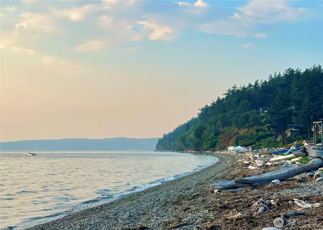a view of a lake with a yard