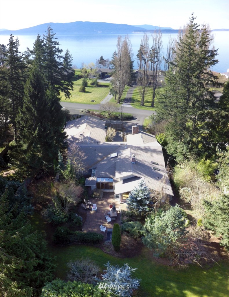 509 Bayside Road Bellingham, WA 98225 - Photo 1 of 17 a view of a lake with a building in the background