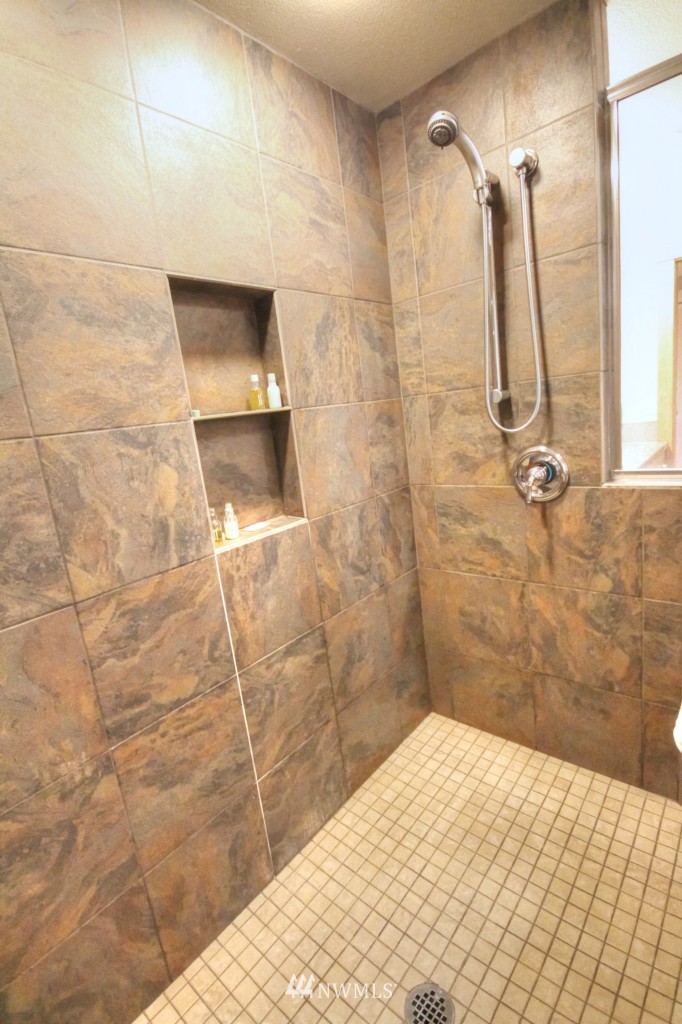 509 Bayside Road Bellingham, WA 98225 - Photo 11 of 17 a bathroom with a shower