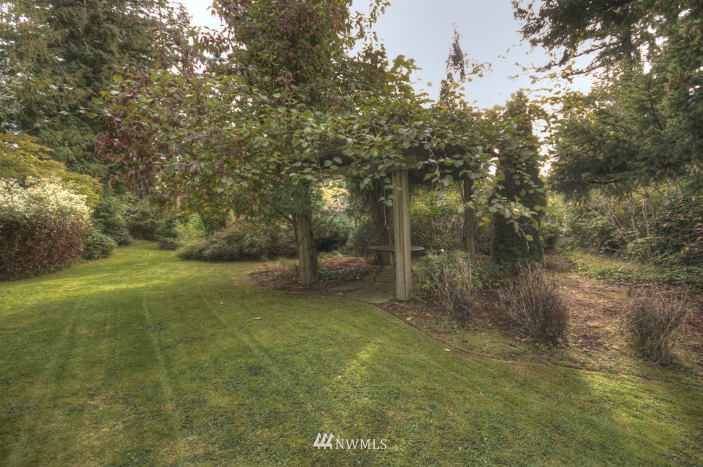 509 Bayside Road Bellingham, WA 98225 - Photo 15 of 17 a view of a trees with a yard