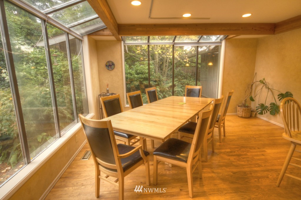 509 Bayside Road Bellingham, WA 98225 - Photo 5 of 17 a dining room with furniture and wooden floor