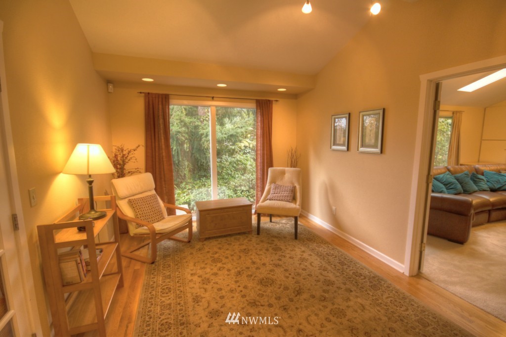 509 Bayside Road Bellingham, WA 98225 - Photo 8 of 17 a living room with furniture and a large window