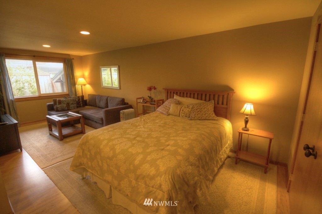 509 Bayside Road Bellingham, WA 98225 - Photo 10 of 17 a spacious bedroom with two beds and a couch