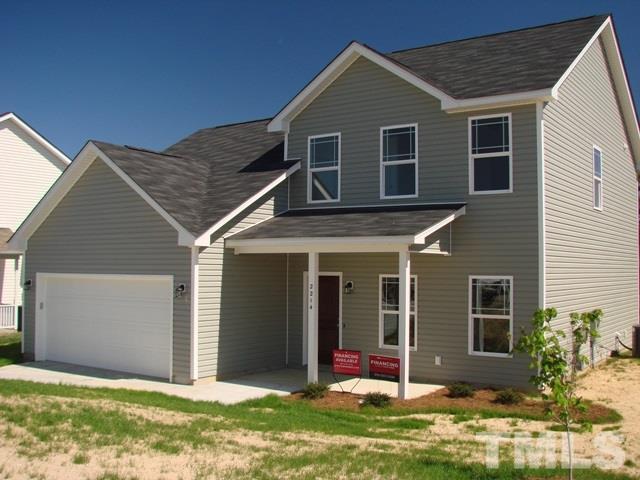 2214 Flowing Drive Raleigh, NC 27610 - Photo 14 of 14 a front view of house with yard