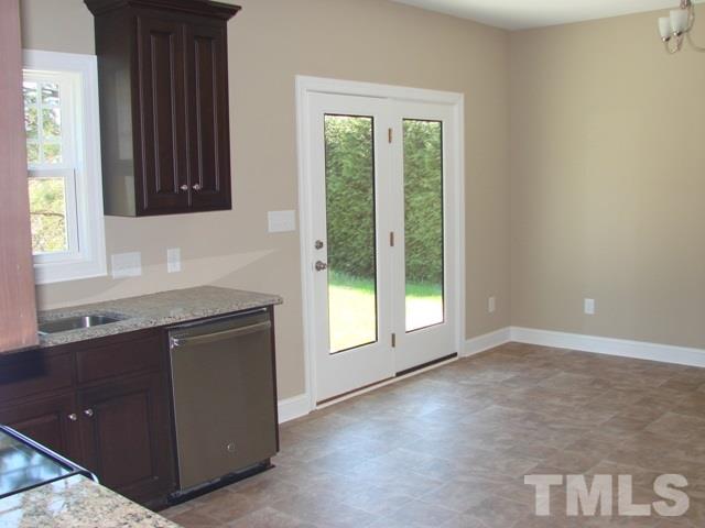2214 Flowing Drive Raleigh, NC 27610 - Photo 4 of 14 a view of an empty room with a window