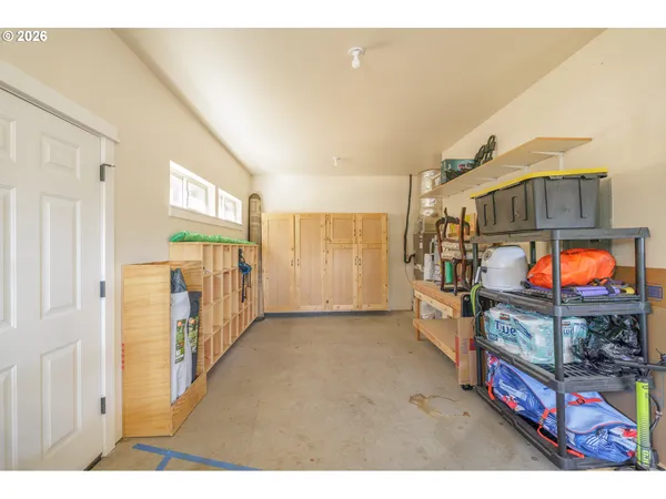 a view of a livingroom with furniture and a garage