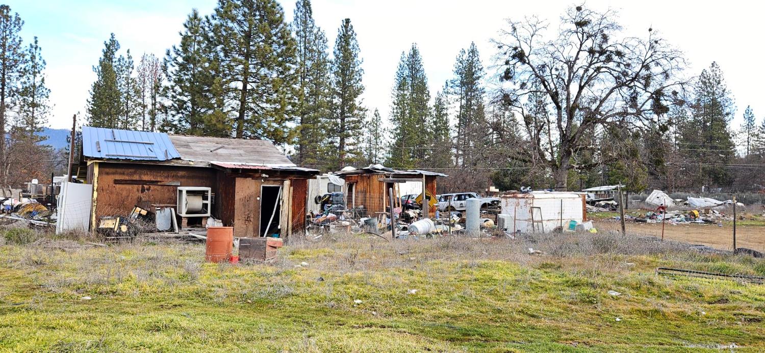 1240 Morgan Hill Road Hayfork, CA 96041 - Photo 16 of 25 a view of a house with a yard patio and fire pit