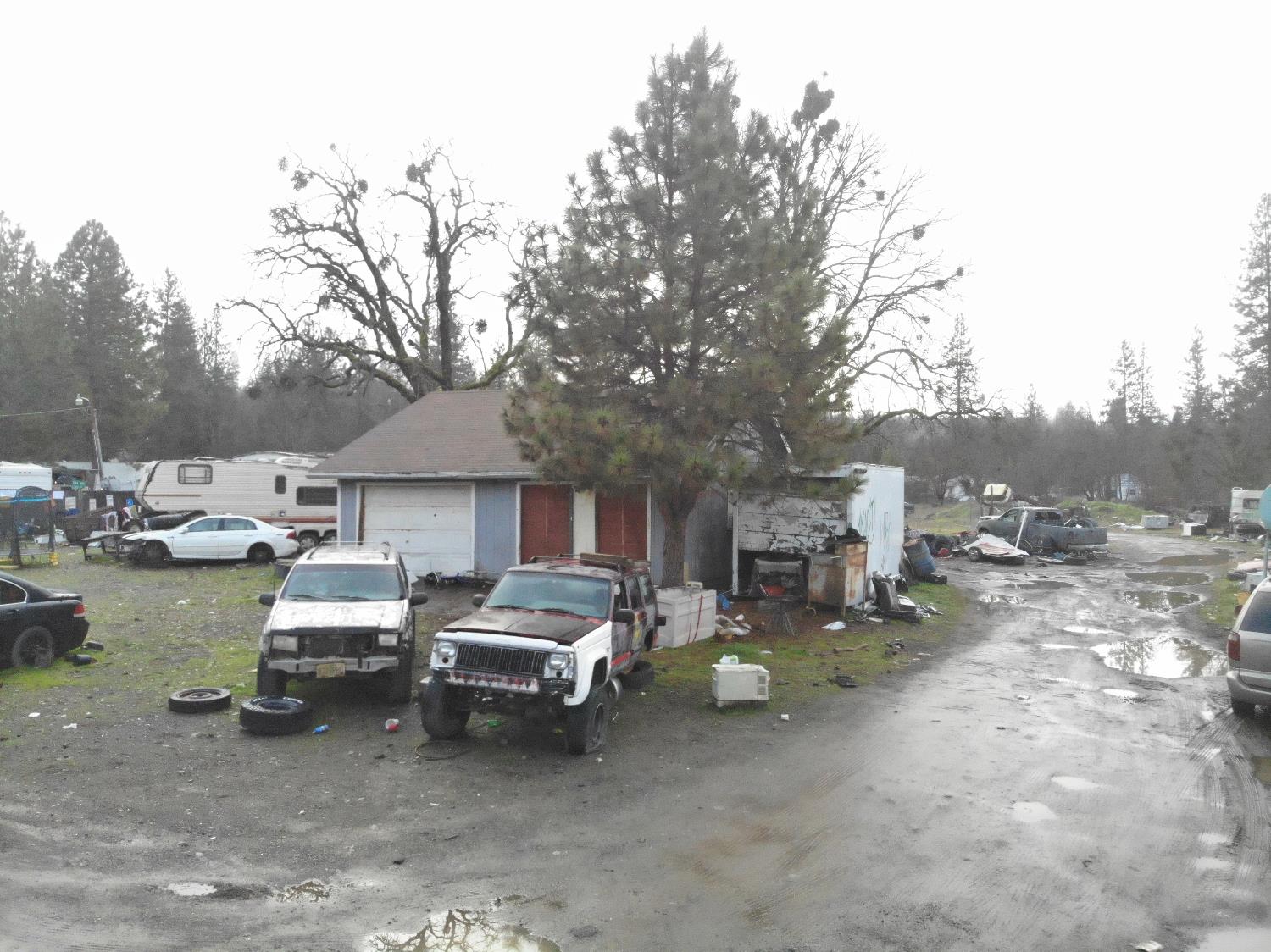 1240 Morgan Hill Road Hayfork, CA 96041 - Photo 9 of 25 a row of couches and chairs under an umbrella