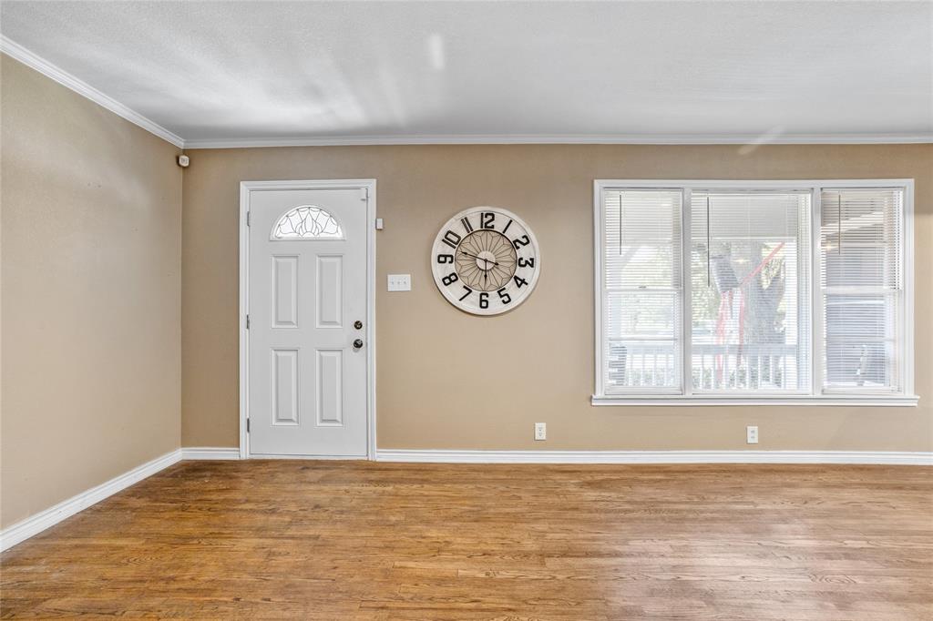 1825 North Highland Avenue Sherman, TX 75092 - Photo 11 of 38 a view of a room with window and a large window