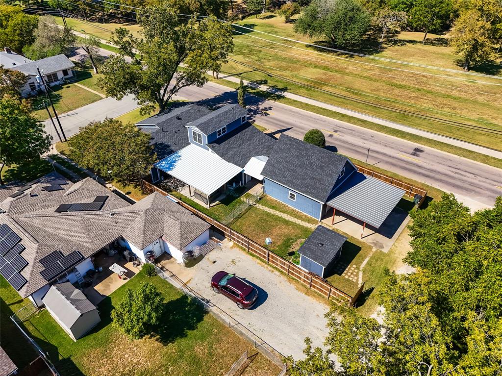 1825 North Highland Avenue Sherman, TX 75092 - Photo 30 of 38 an aerial view of residential house with outdoor space