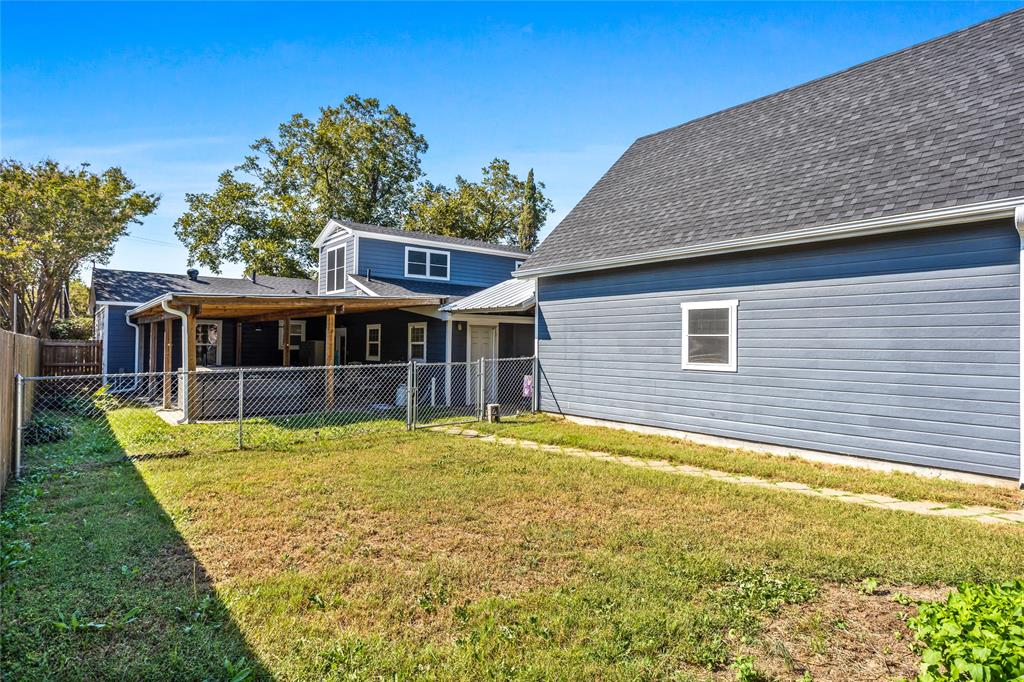 1825 North Highland Avenue Sherman, TX 75092 - Photo 31 of 38 a view of a house with a swimming pool