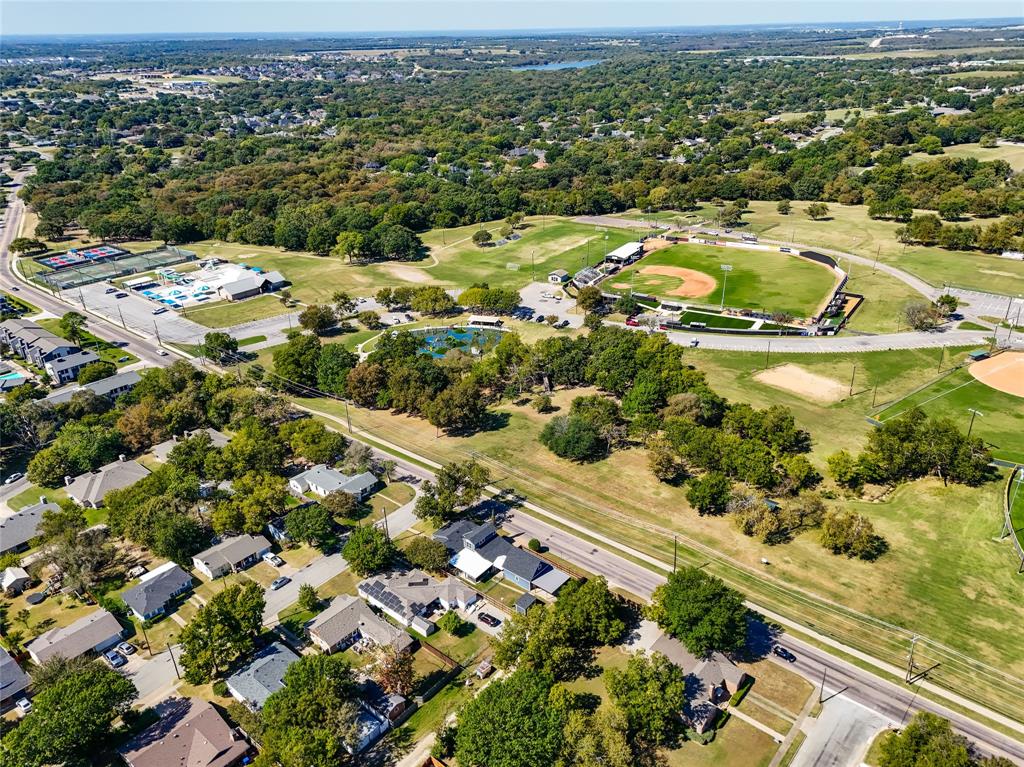 1825 North Highland Avenue Sherman, TX 75092 - Photo 35 of 38 an aerial view of residential houses with outdoor space