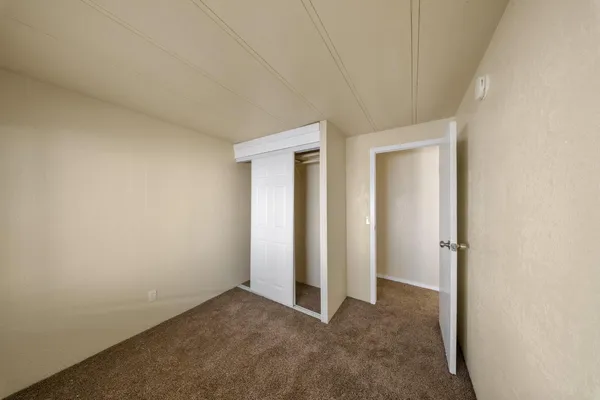 an empty room with closet