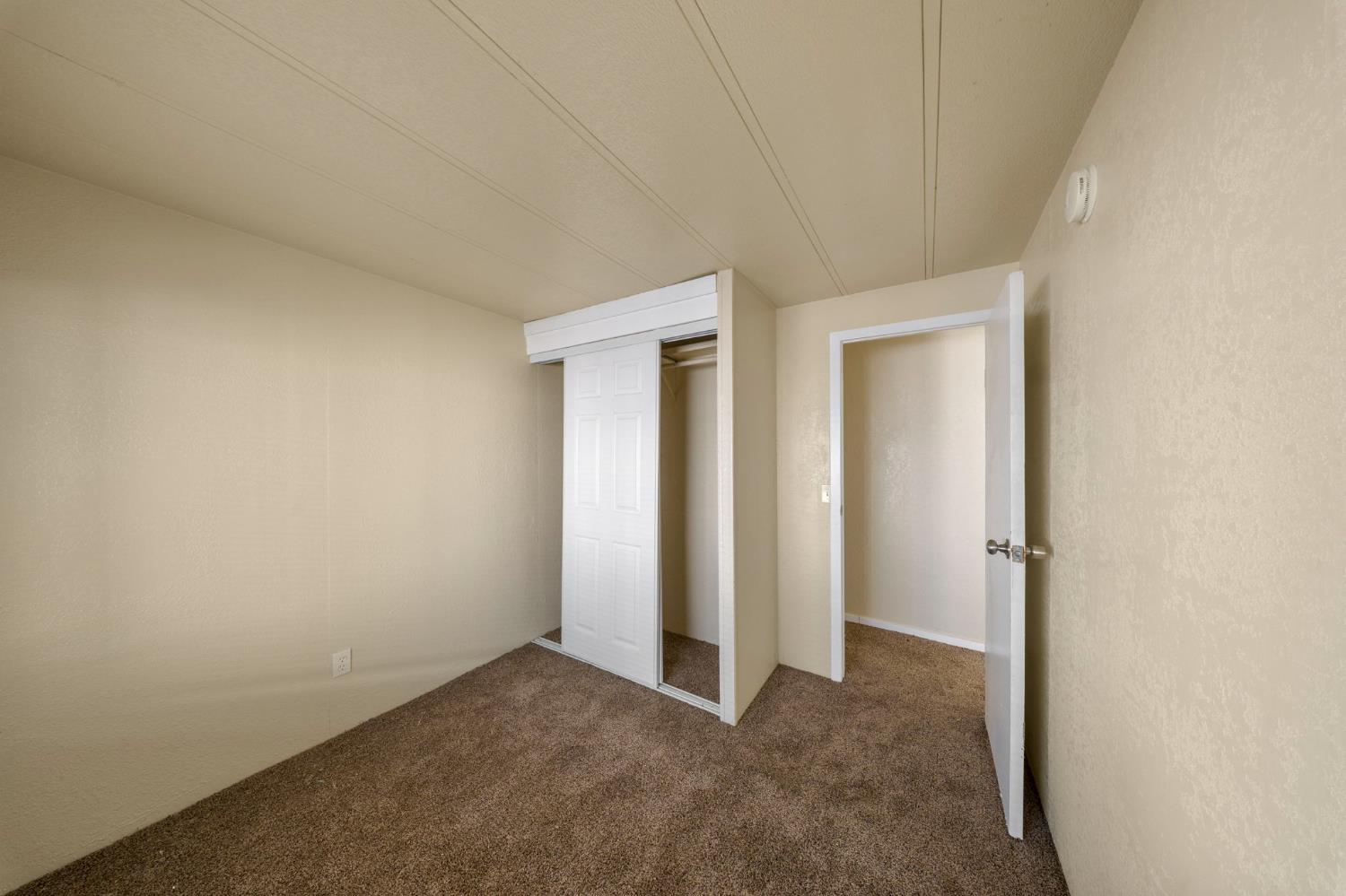 3550 Mitchell Road, Unit 59 Ceres, CA 95307 - Photo 12 of 18 an empty room with closet