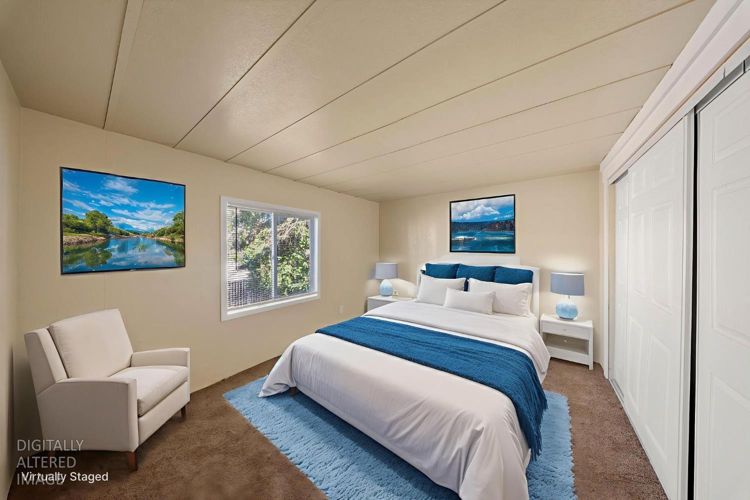 3550 Mitchell Road, Unit 59 Ceres, CA 95307 - Photo 17 of 18 a bedroom with a bed and a couch