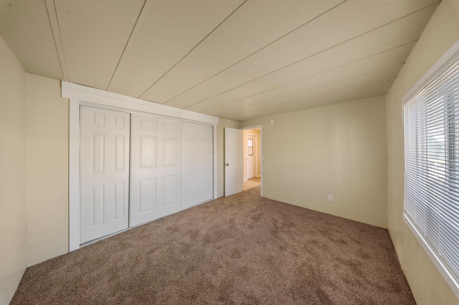 3550 Mitchell Road, Unit 59 Ceres, CA 95307 - Photo 18 of 18 a view of an empty room and a window