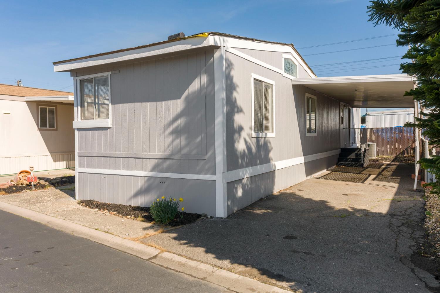 3550 Mitchell Road, Unit 59 Ceres, CA 95307 - Photo 3 of 18 a view of a house with a outdoor space