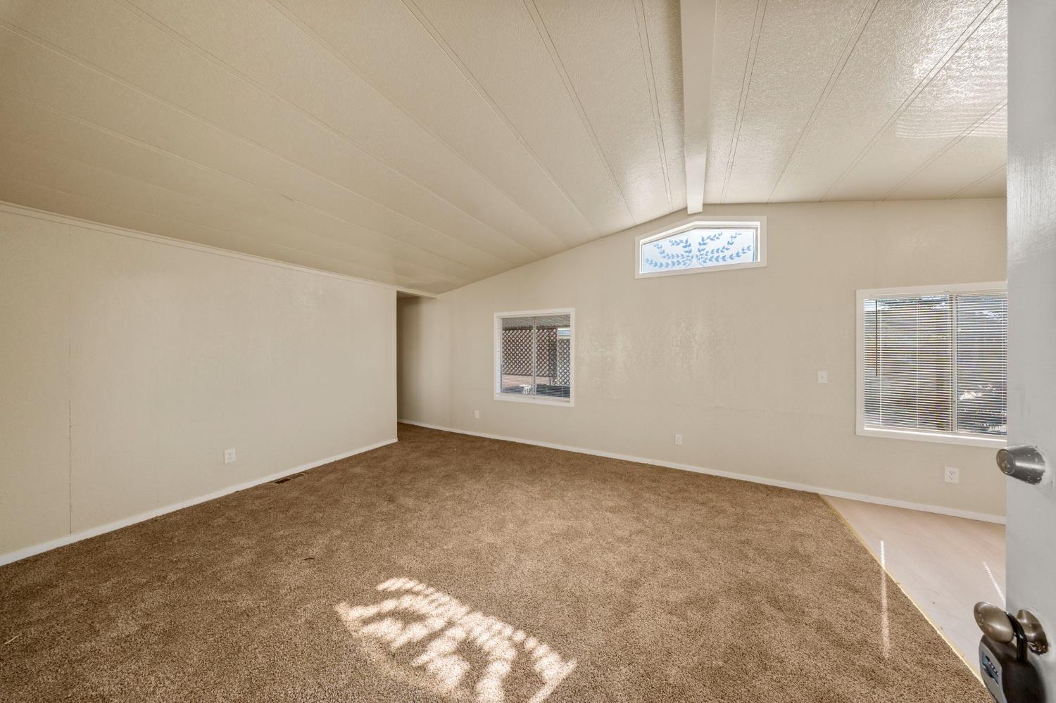 3550 Mitchell Road, Unit 59 Ceres, CA 95307 - Photo 5 of 18 an empty room with a window
