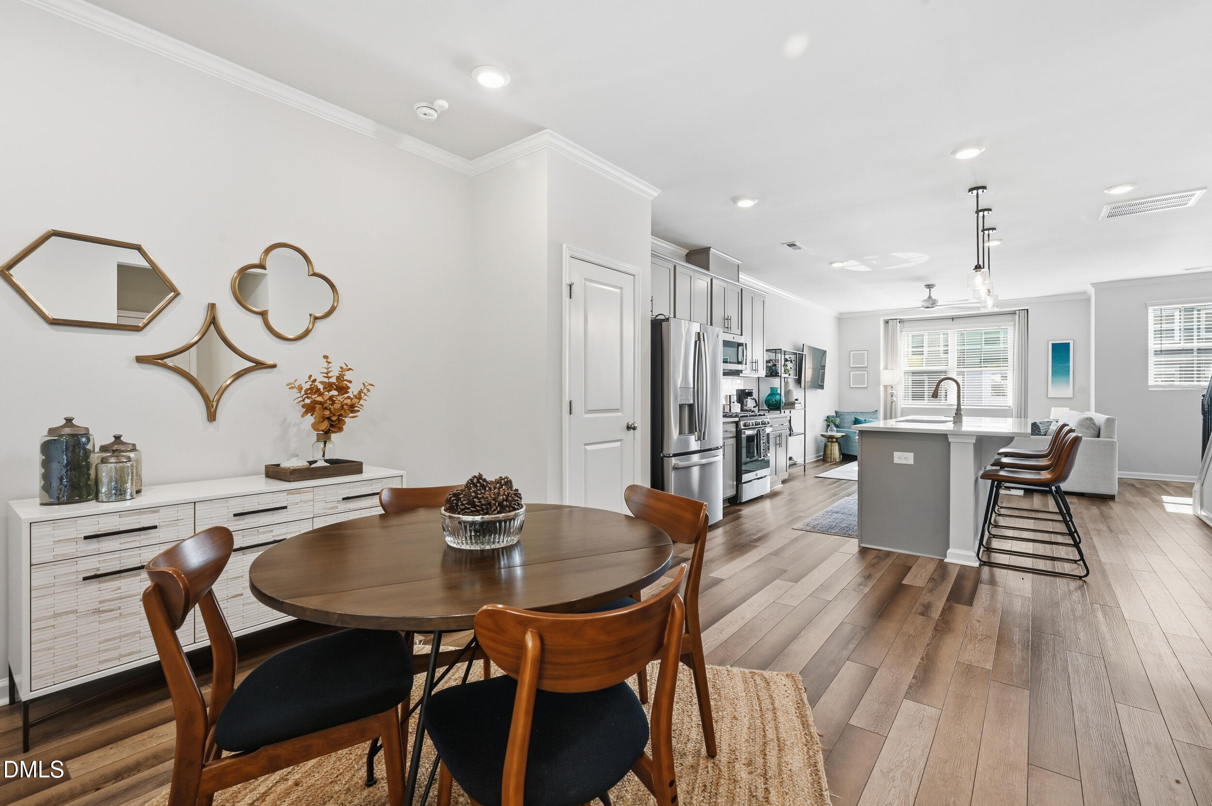 2536 Laurel Valley Way Raleigh, NC 27604 - Photo 8 of 16 a view of a dining room with furniture and wooden floor