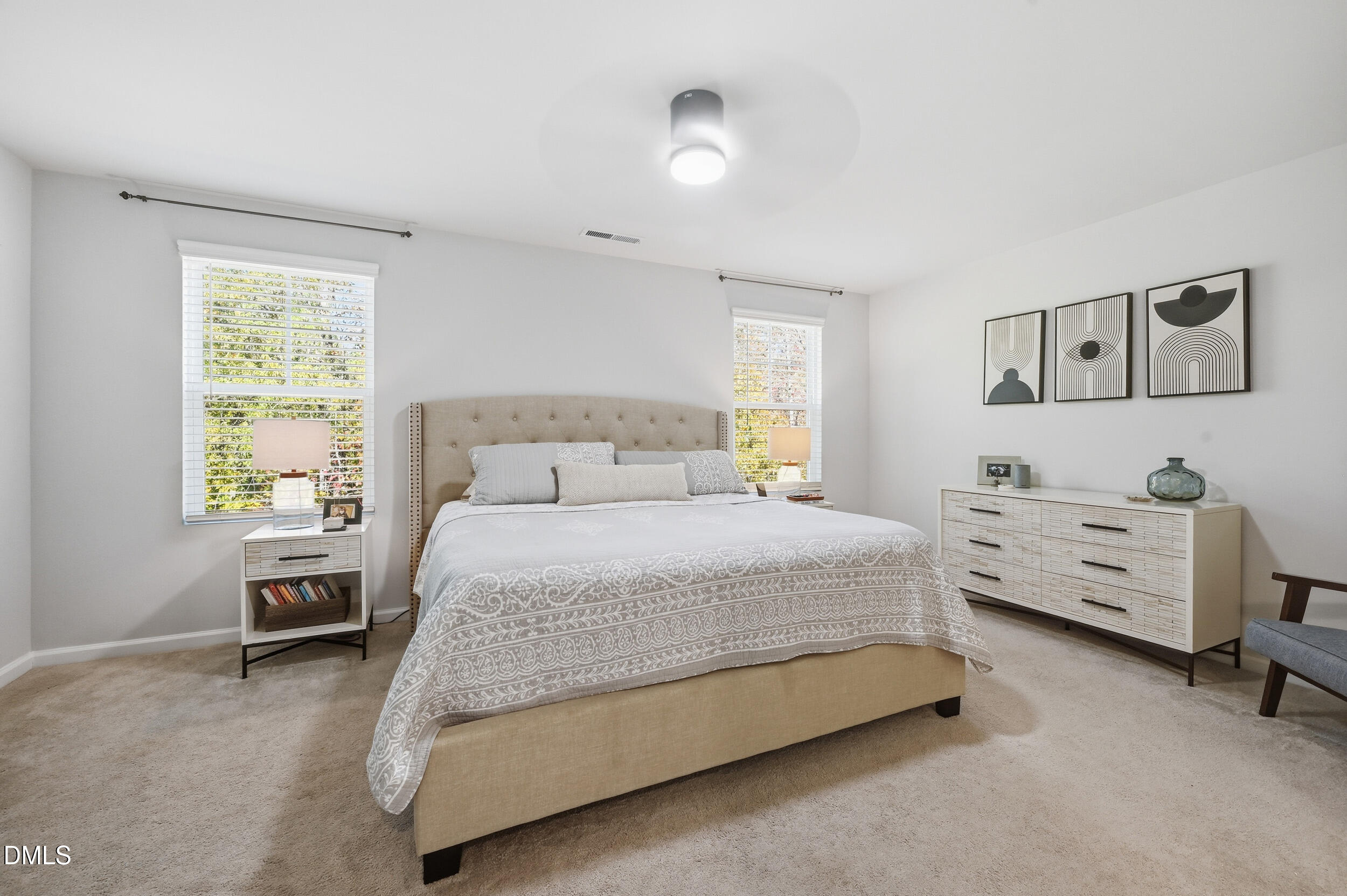 2536 Laurel Valley Way Raleigh, NC 27604 - Photo 10 of 16 a bedroom with a bed and a dresser