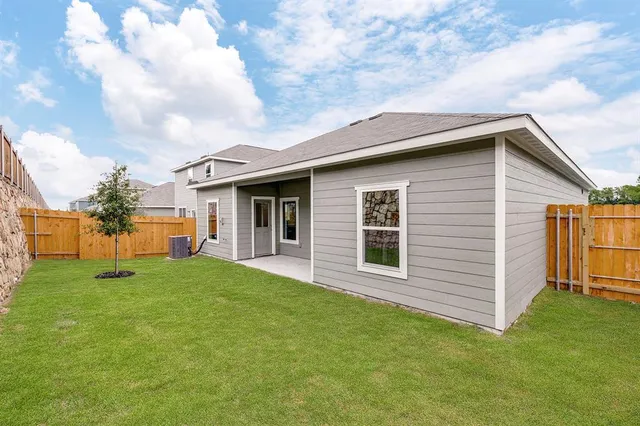 a front view of house with yard and porch