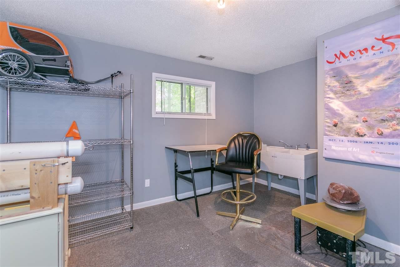 1901 Medfield Road Raleigh, NC 27607 - Photo 17 of 25 Studio/Study space is currently being used as a pottery studio, perfect for a home office!