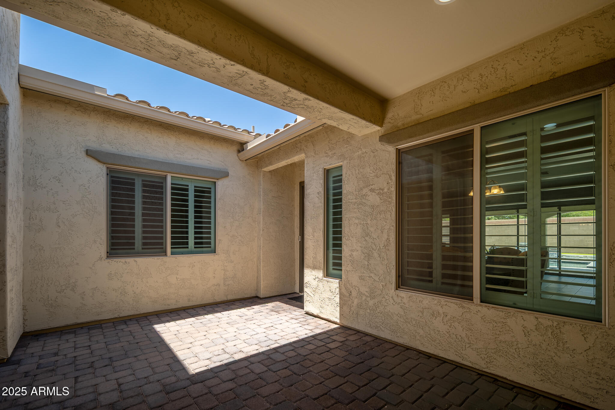 9752 West Rowel Road Peoria, AZ 85383 - Photo 48 of 48 48_Courtyard_01