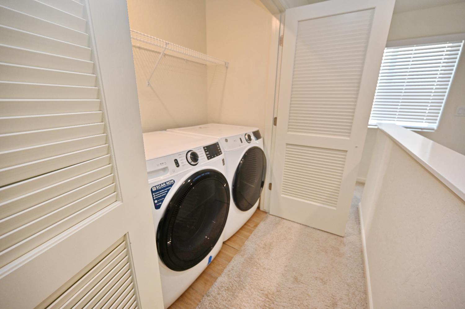 2273 North Raleigh Drive Fresno, CA 93727 - Photo 21 of 29 a utility room with dryer and washer
