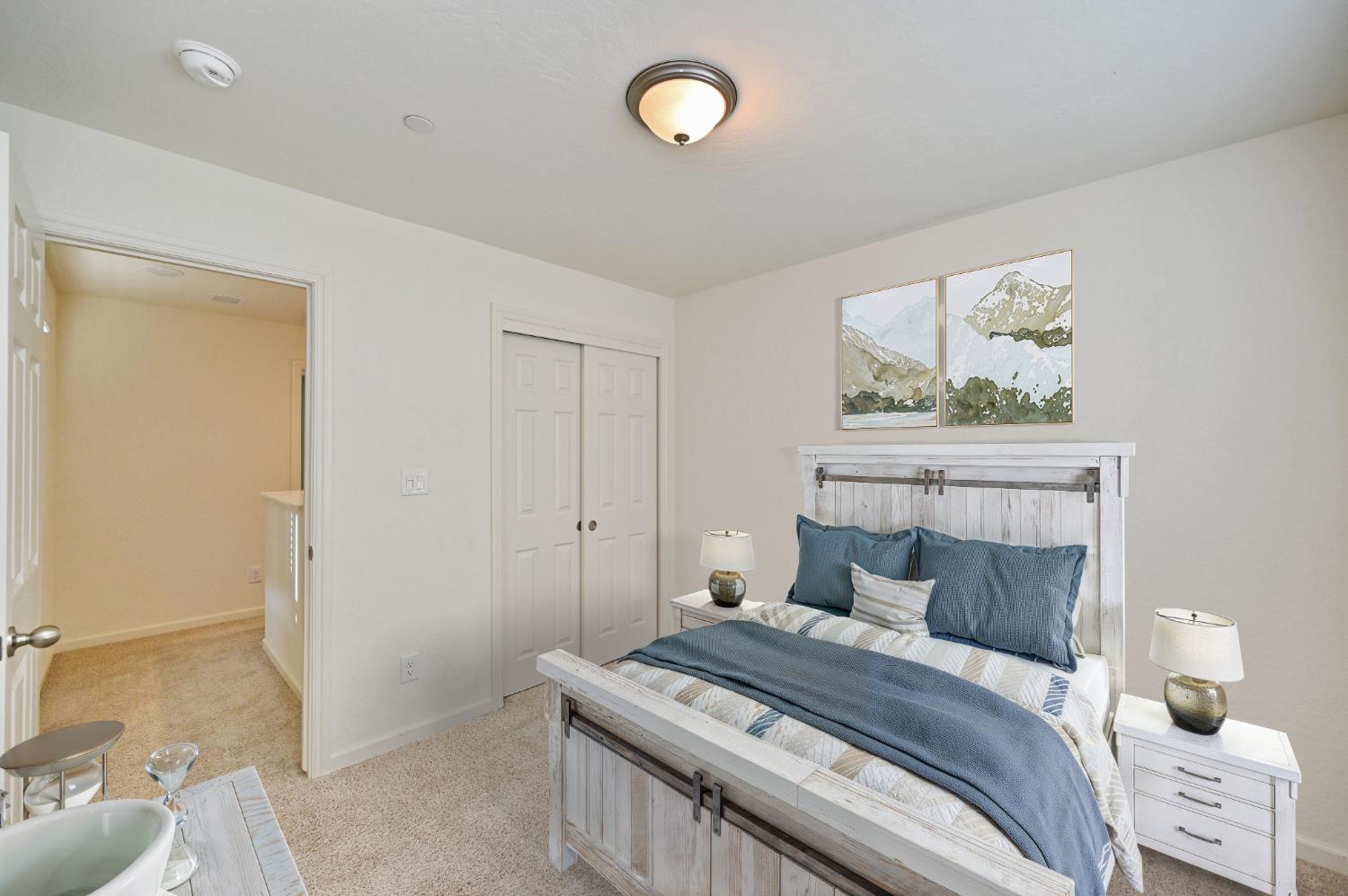 2273 North Raleigh Drive Fresno, CA 93727 - Photo 26 of 29 a bedroom with a bed and a cabinets